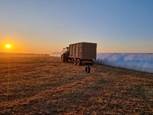 A truck in a field  AI-generated content may be incorrect.